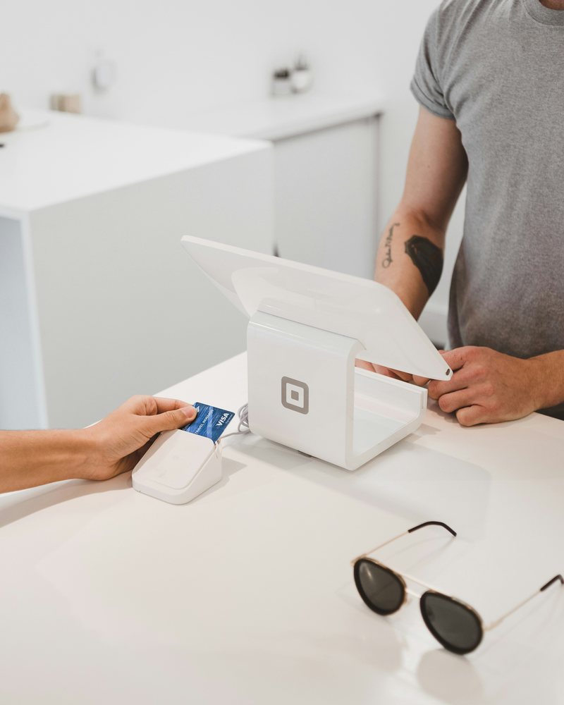 Paying by card at a checkout counter